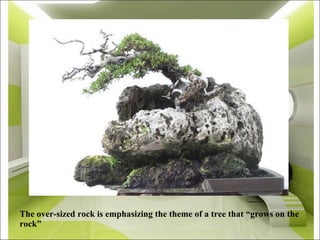 The over-sized rock is emphasizing the theme of a tree that “grows on the rock” 