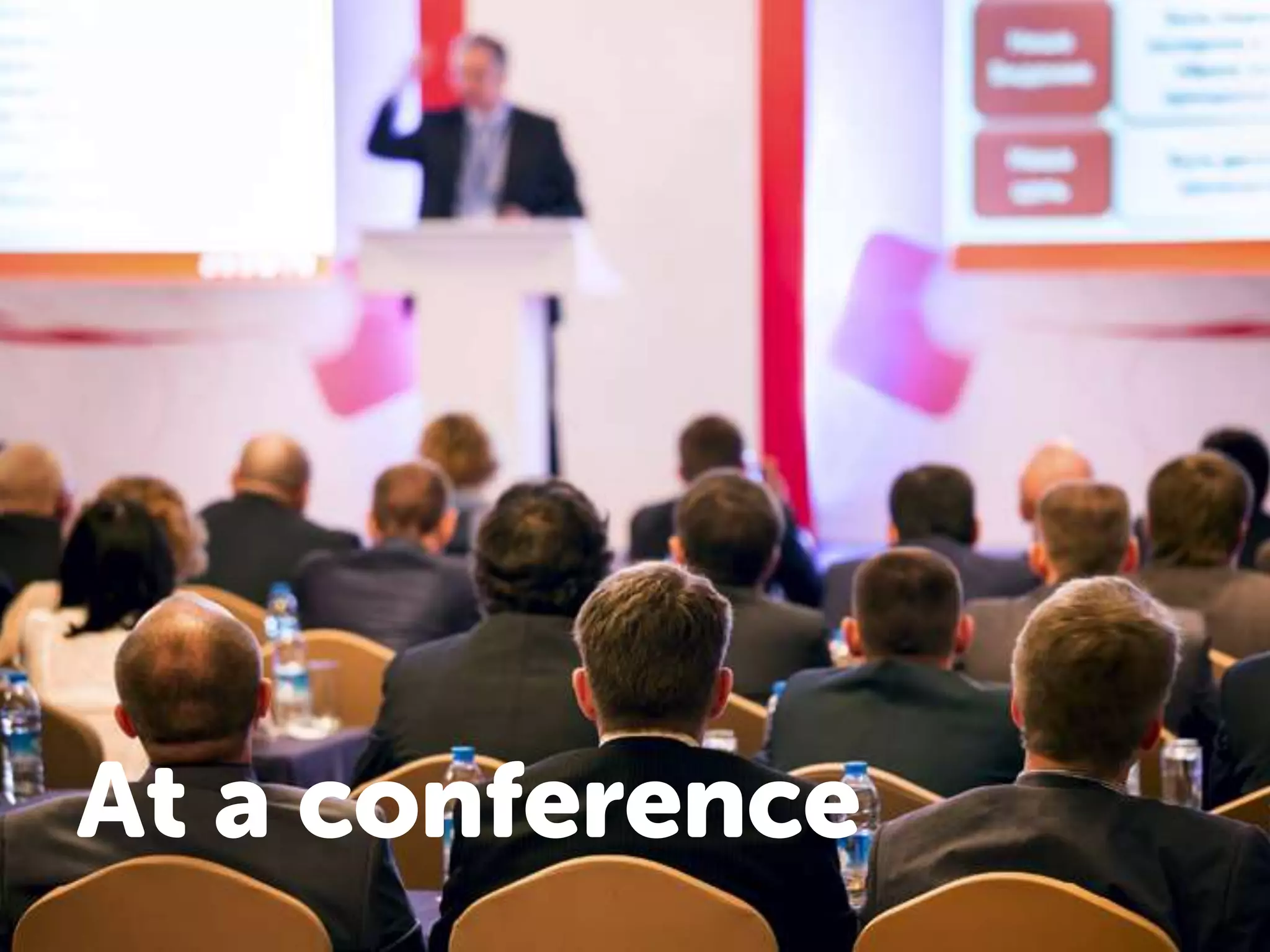 At a conference 
 