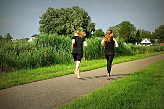 Women jogging on the countryside
