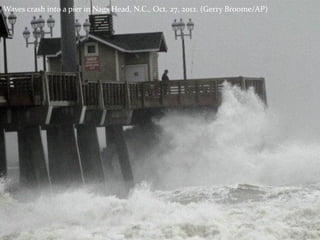 Waves crash into a pier in Nags Head, N.C., Oct. 27, 2012. (Gerry Broome/AP)
 
