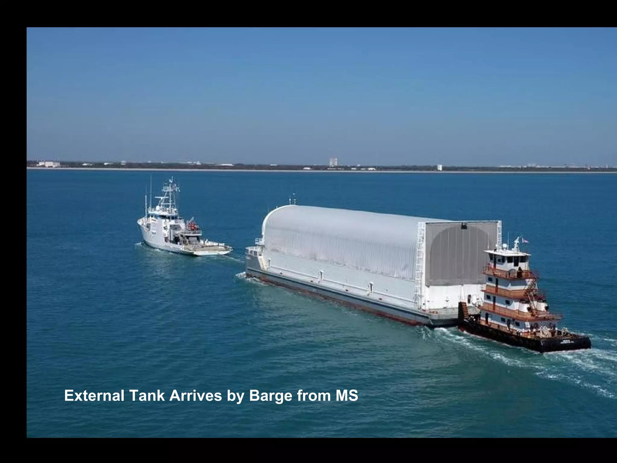 External Tank Arrives by Barge from MS