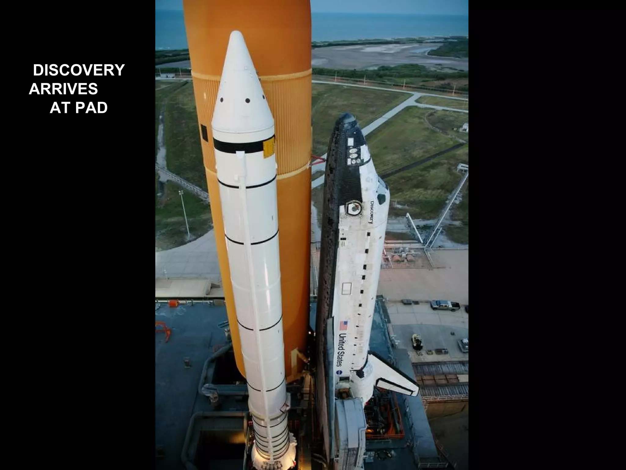 DISCOVERY
ARRIVES
AT PAD