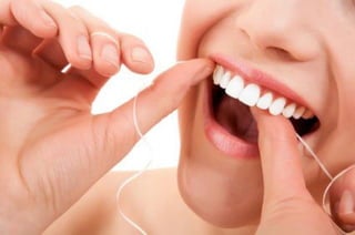 Flossing helps prevent tooth decay and gum disease.
