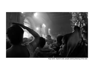 Puja starts, Saptami arati, people seeking blessing of the arati
 