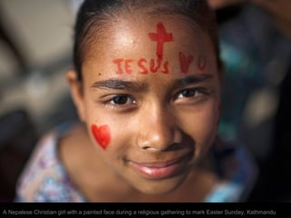 A Nepalese Christian girl with a painted face during a religious gathering to mark Easter Sunday, Kathmandu
 
