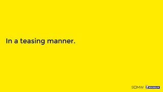 In a teasing manner.
 