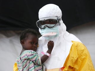 A child, age 3, prepares to leave the Doctors Without 
Borders (MSF), treatment center after recovering from 
the Ebola vi...