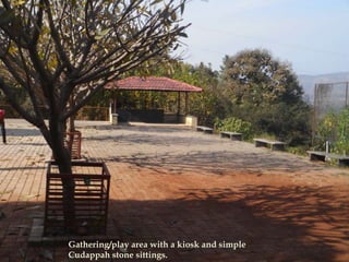Gathering/play area with a kiosk and simple
Cudappah stone sittings.
 