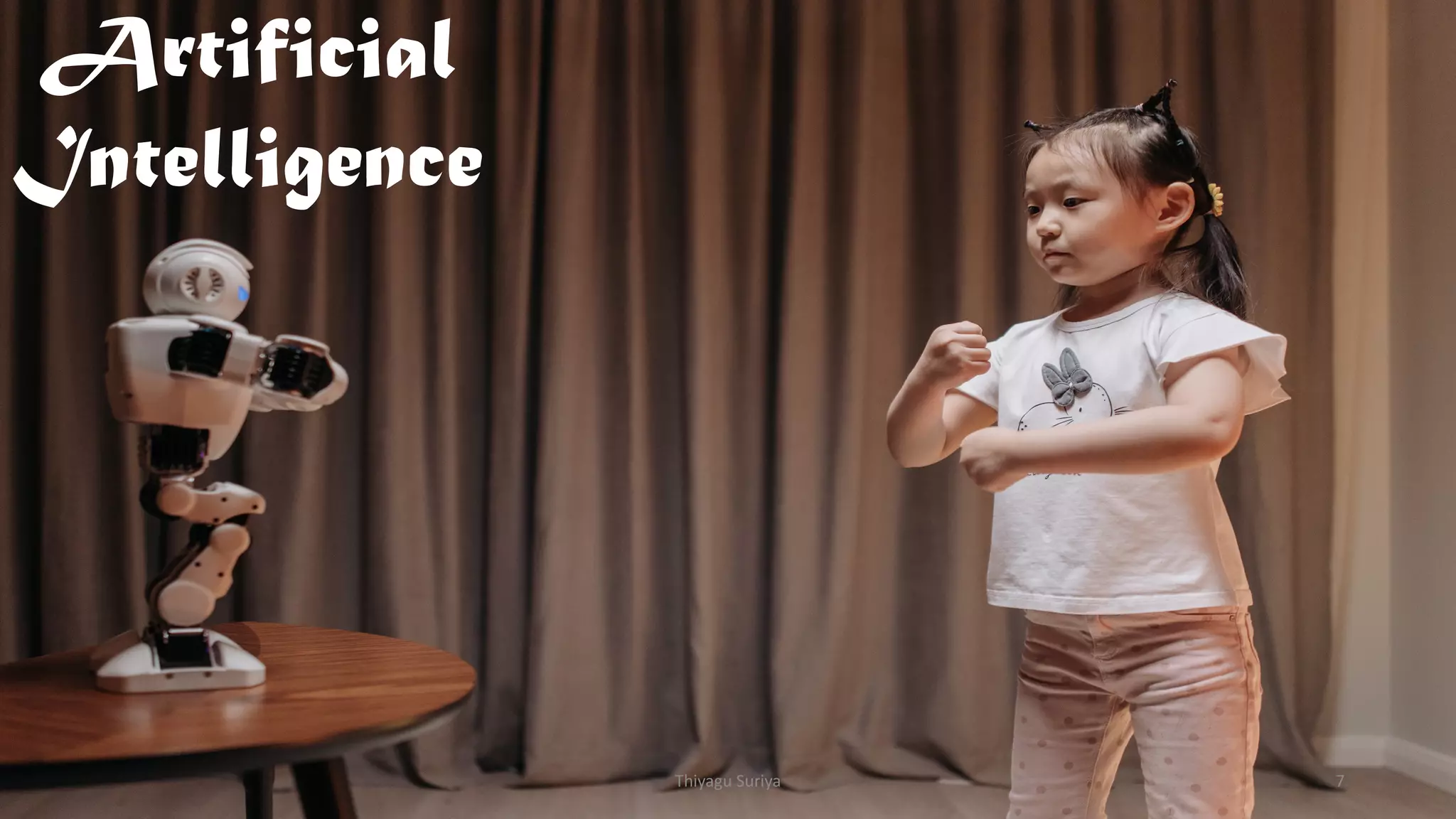 Artificial
Intelligence
Thiyagu Suriya 7
 