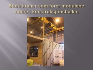 Store kraner som fører modulene videre i konstruksjonshallen