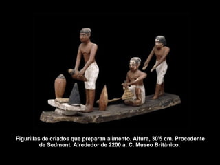 Figurillas de criados que preparan alimento. Altura, 30'5 cm. Procedente de Sedment. Alrededor de 2200 a. C. Museo Británico.  