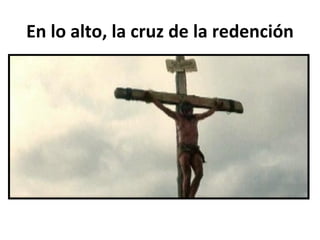 En lo alto, la cruz de la redención 