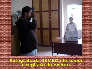Fotógrafo da SEMEC efetuando  o registro do evento. 