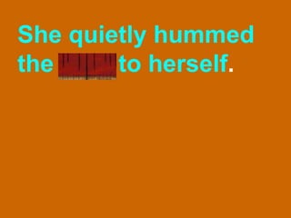 She quietly hummed the tune to herself . 