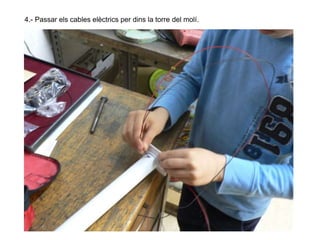4.- Passar els cables elèctrics per dins la torre del molí.

 