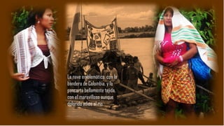 La nave emblemática, con la
bandera de Colombia, y la
pancarta bellamente tejida,
con el maravilloso aunque
dolorido adiós al río.
 