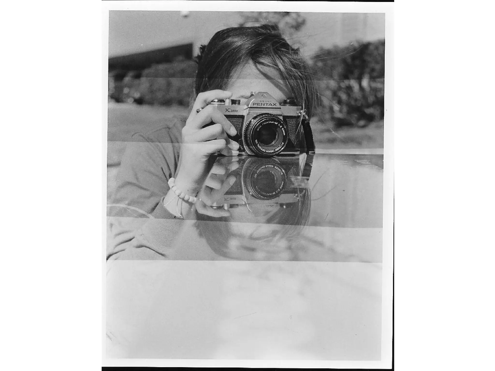 • Final Print from 1
large split time
test strip, then 1
final large test
strip. A small
change in time
was made…
resulting in TOO
dark of a print.
• Processing was
also flawed
resulting in
uneven
development.

 