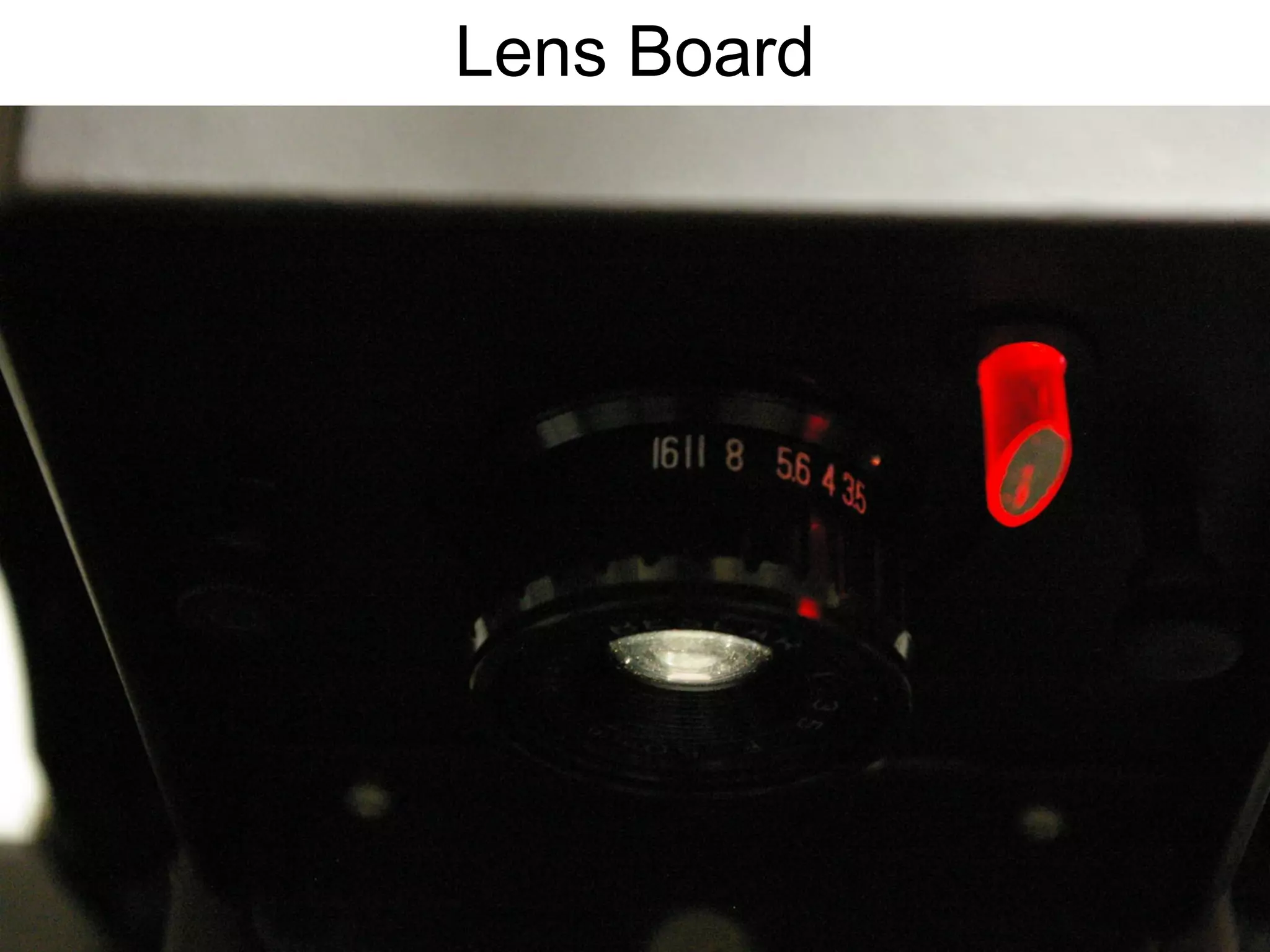 Lens Board
• Has a little
translucent
red peg that
glows when
the enlarger is
turned on to
illuminate the
aperture ring
of the enlarger
lens.

 