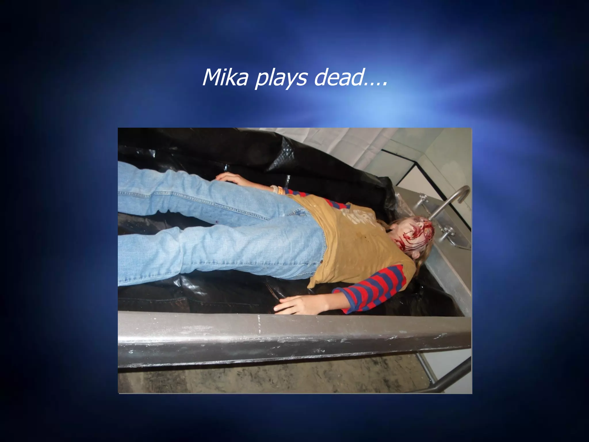 Mika plays dead…. 