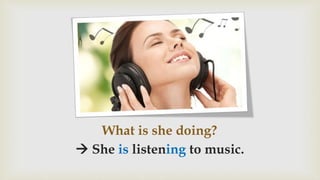 What is she doing?
 She is listening to music.
 