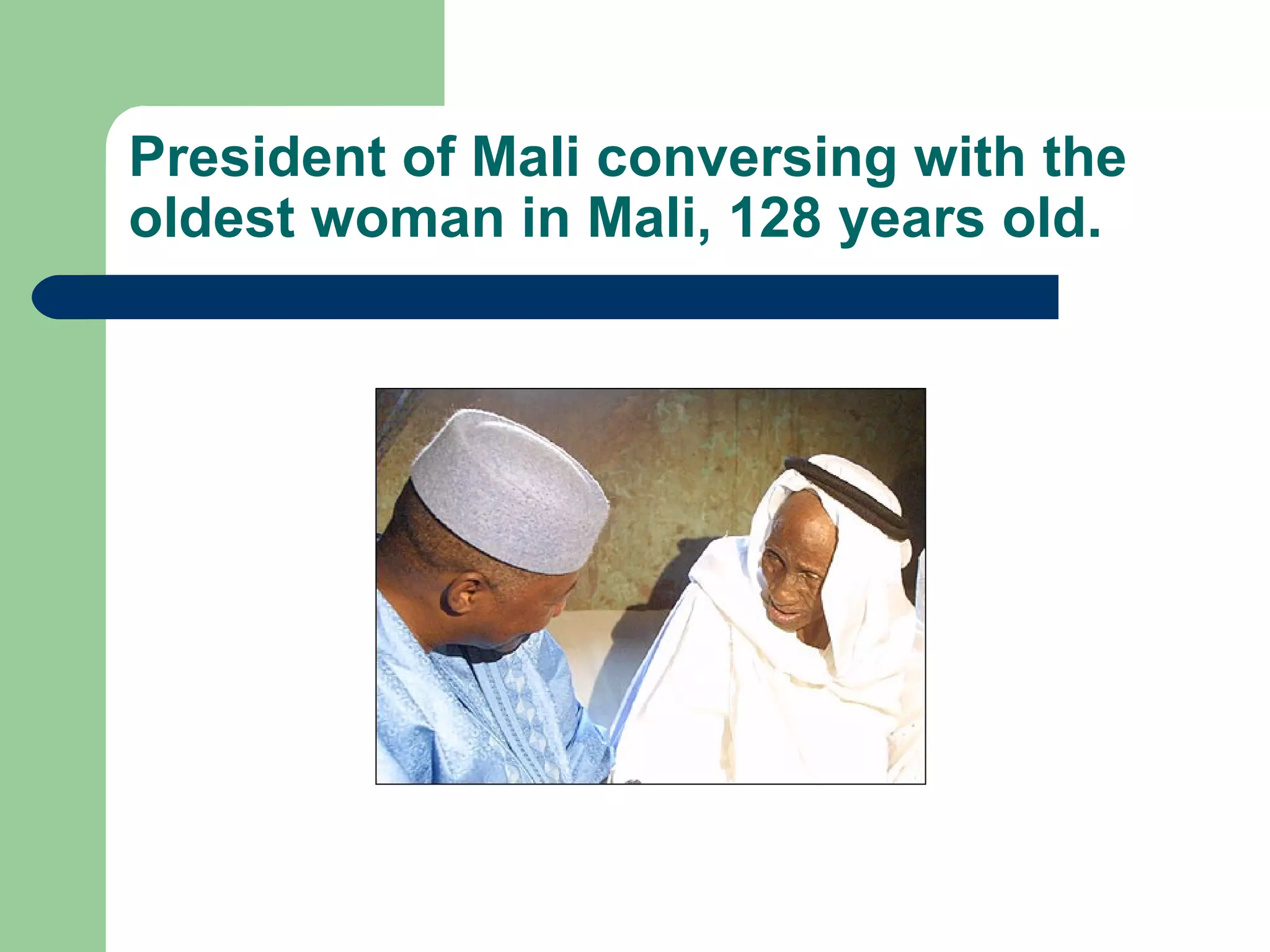 President of Mali conversing with the oldest woman in Mali, 128 years old. 