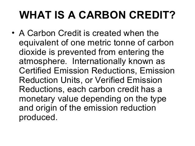 How do cap-and-trade systems motivate companies to reduce carbon emissions
