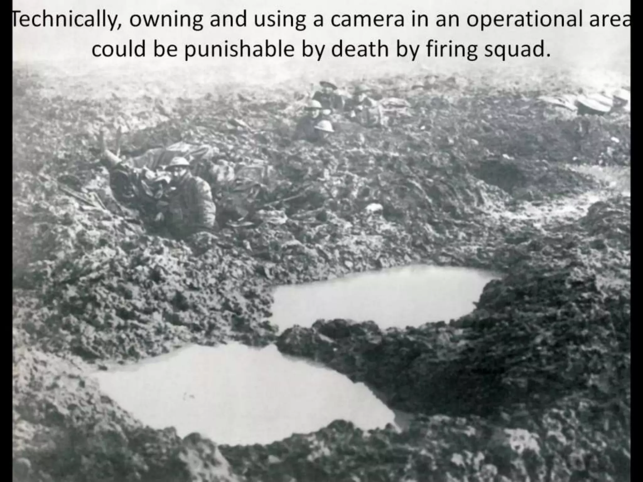 Technically, owning and using a camera in an operational area
could be punishable by death by firing squad.
 