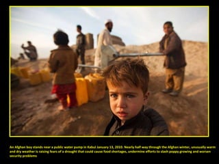 An Afghan boy stands near a public water pump in Kabul January 13, 2010. Nearly half way through the Afghan winter, unusually warm  and dry weather is raising fears of a drought that could cause food shortages, undermine efforts to slash poppy growing and worsen  security problems 
