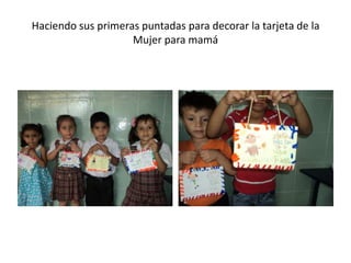 Haciendo sus primeras puntadas para decorar la tarjeta de la
Mujer para mamá

 