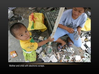 Mother and child with electronic scraps.  