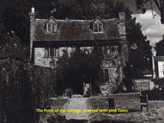 The front of the cottage, covered with pink roses
 