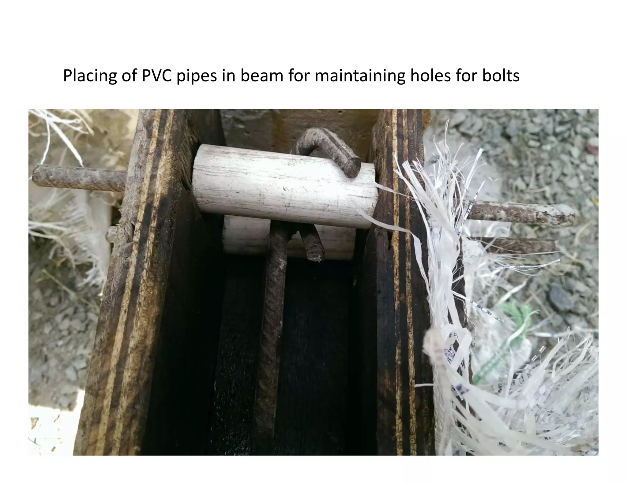 Placing of PVC pipes in beam for maintaining holes for bolts
 