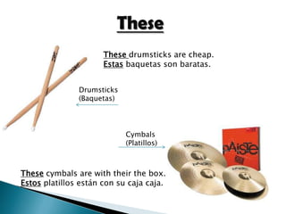 ThoseThisThis guitar isbeautiful. Esta guitarra es hermosa.Thiselectric bassisused. Este bajo eléctrico está usadoElectric Bass(Bajo eléctrico)Guitar(Guitarra)