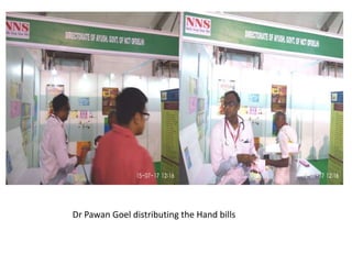 Dr Pawan Goel distributing the Hand bills
 