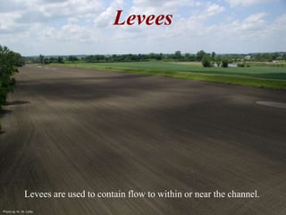 Photo by W. W. Little 
Levees 
Levees are used to contain flow to within or near the channel. 
 