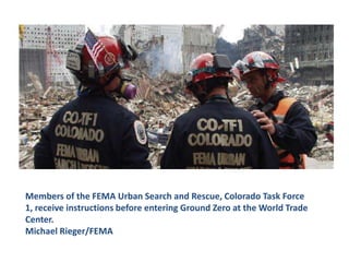 Members of the FEMA Urban Search and Rescue, Colorado Task Force 1, receive instructions before entering Ground Zero at the World Trade Center. Michael Rieger/FEMA