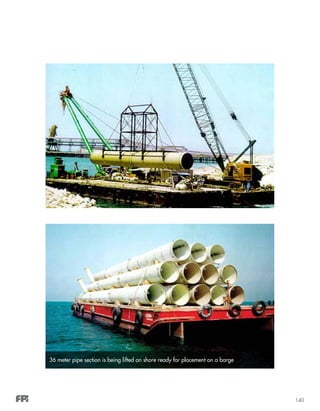 140
36 meter pipe section is being lifted on shore ready for placement on a barge
 