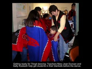 Getting ready for Tlingit dancing: Teachers Mary Jean Duncan and Sally Kookesh help get students in their blankets before the dance. 