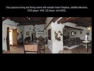 Very spacious living and dining rooms with wooden beam fireplace, satellite television, DVD player, VHS, CD player, and ADSL. 