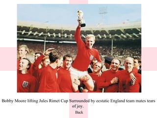 Bobby Moore lifting Jules Rimet Cup Surrounded by ecstatic England team mates tears of joy.  Back 