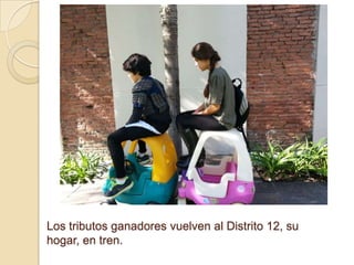 Los tributos ganadores vuelven al Distrito 12, su
hogar, en tren.

 