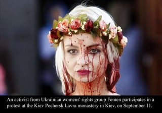 An activist from Ukrainian womens' rights group Femen participates in a 
protest at the Kiev Pechersk Lavra monastery in Kiev, on September 11. 
 