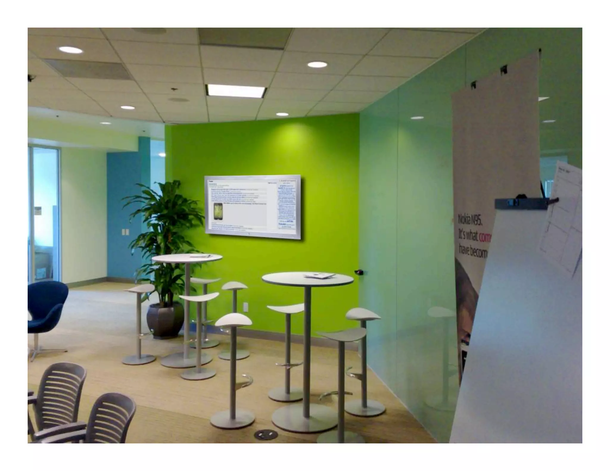 Friendsters At Work: Displaying Social Media Streams in the Workplace