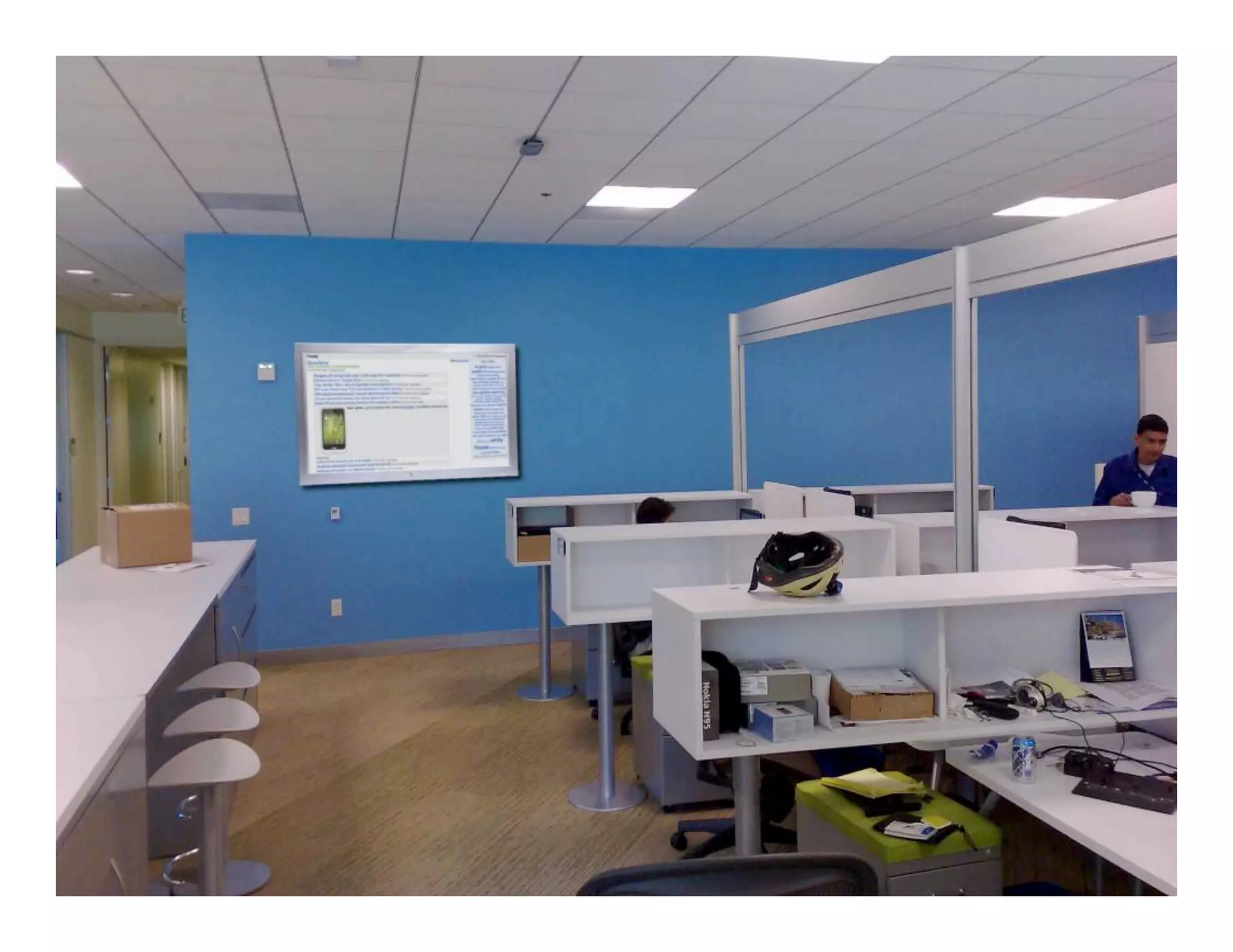 Friendsters At Work: Displaying Social Media Streams in the Workplace