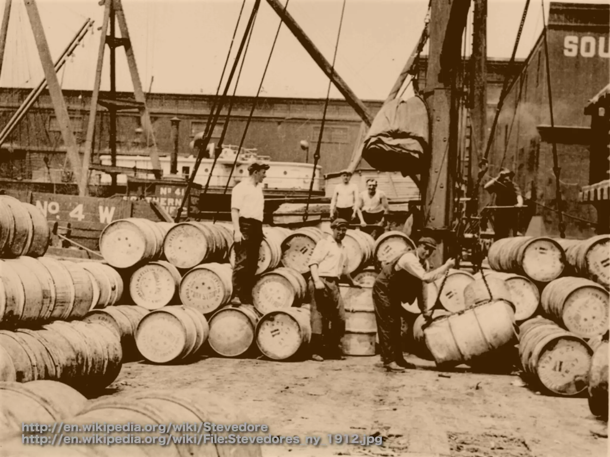 http://en.wikipedia.org/wiki/Stevedore
http://en.wikipedia.org/wiki/File:Stevedores_ny_1912.jpg
 