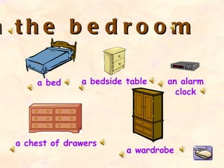 In the bedroom a bed a chest of drawers a bedside table a wardrobe an alarm clock 