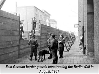 East German border guards constructing the Berlin Wall in
August, 1961
East German border guards constructing the Berlin Wall in
August, 1961
 