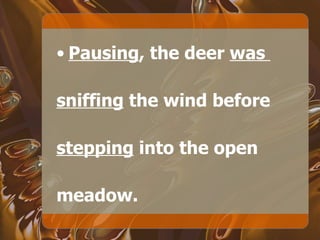 Pausing , the deer  was  sniffing  the wind before  stepping  into the open meadow. 