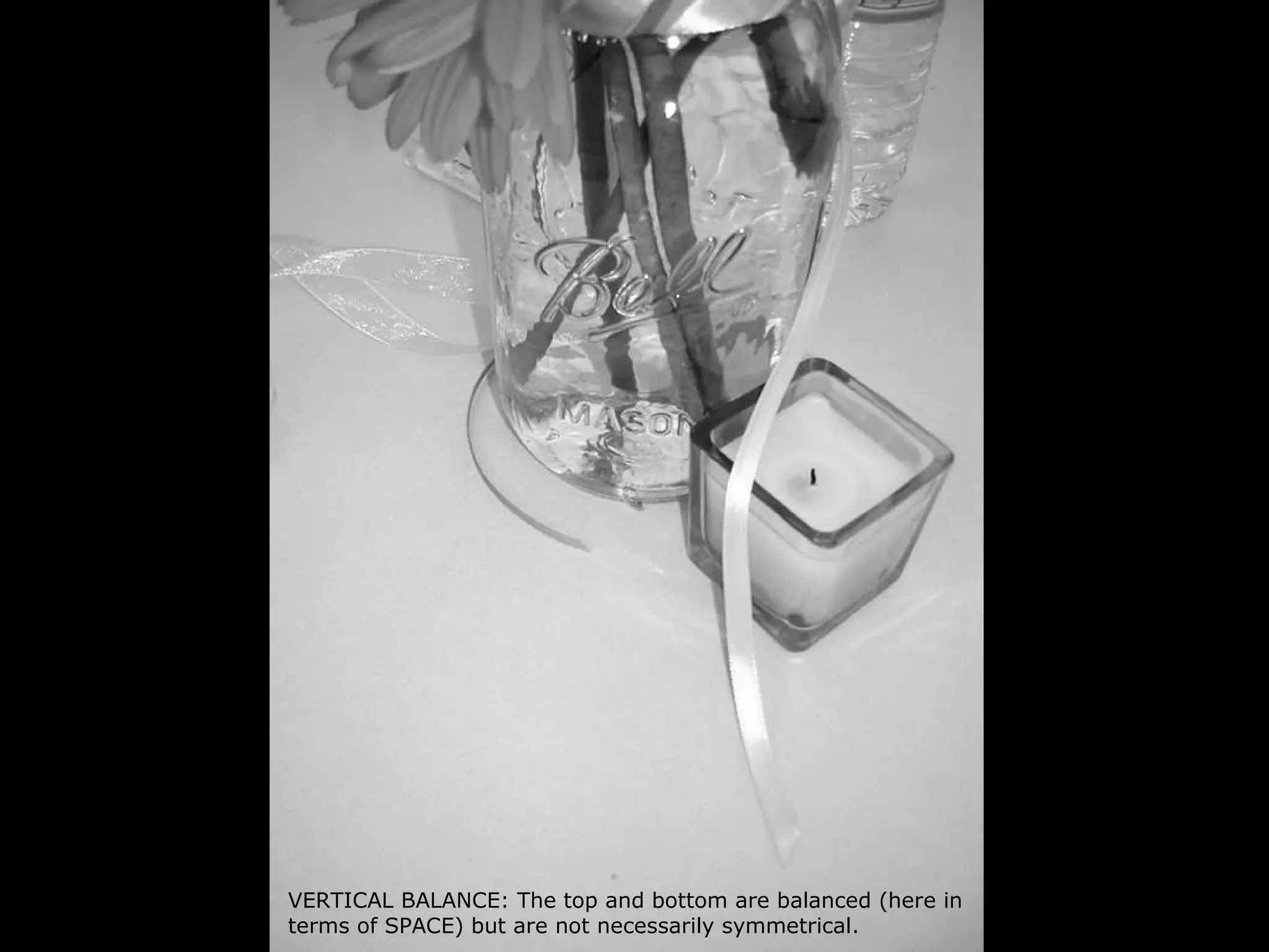 VERTICAL BALANCE: The top and bottom are balanced (here in terms of SPACE) but are not necessarily symmetrical.  