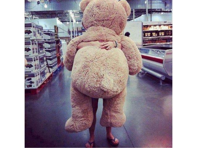 girl with giant teddy bear